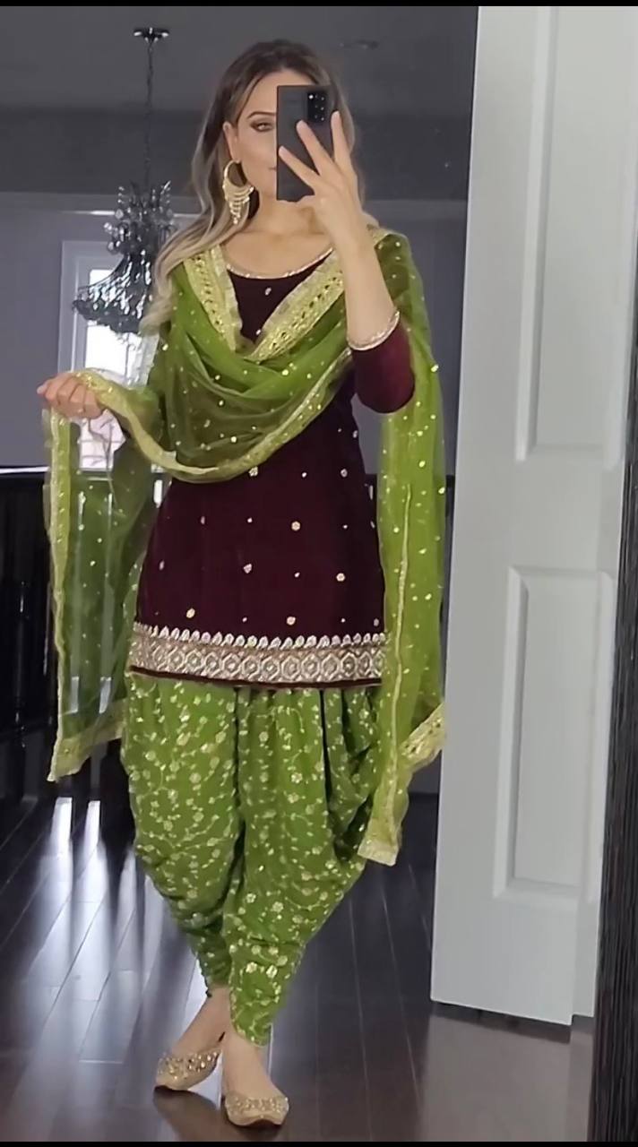 Our Marron Color embroidered Patliya suit is designed for your special occasions, so you can shine with elegance at every event.