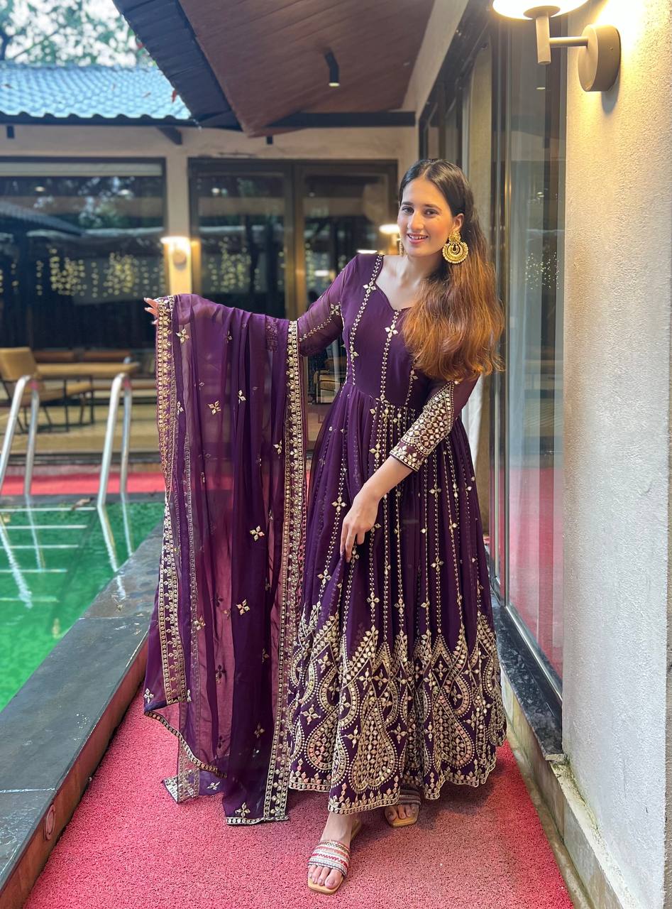 For every occasion, wrap yourself in regal charm in our violet Anarkali gown, which radiates grace, elegance, tradition, and timeless beauty.