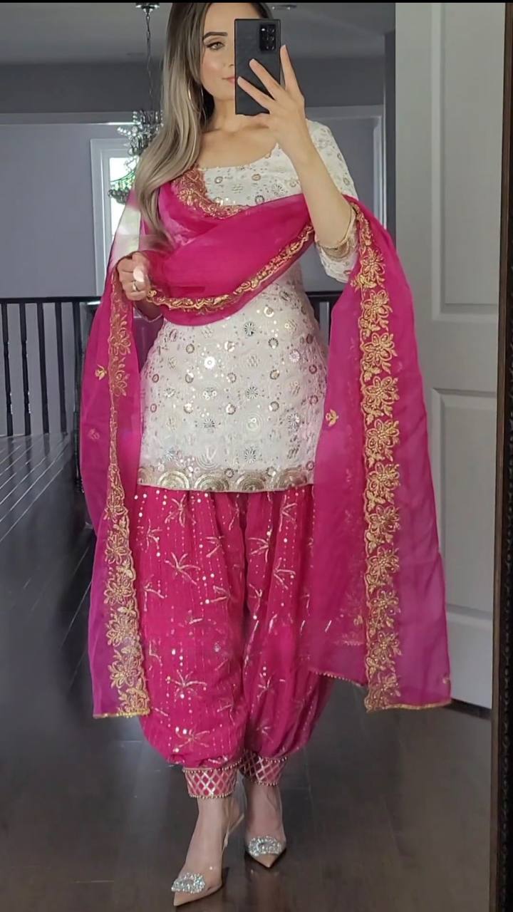 Glow elegantly at every event—this white Patliya suit with embroidery is designed for your most memorable occasions.