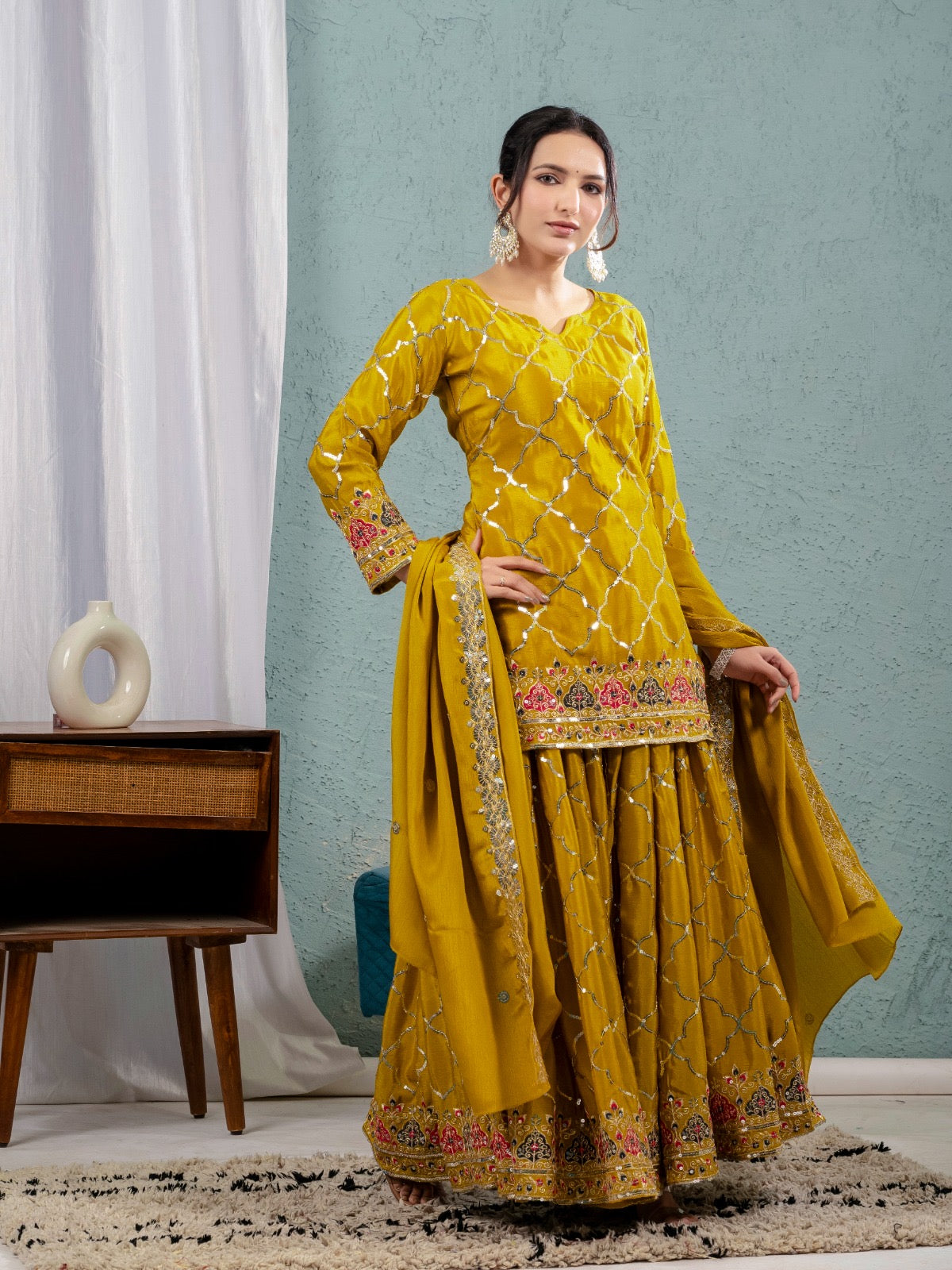 Wear our glowing yellow sharara outfit and shine brighter than the sun.