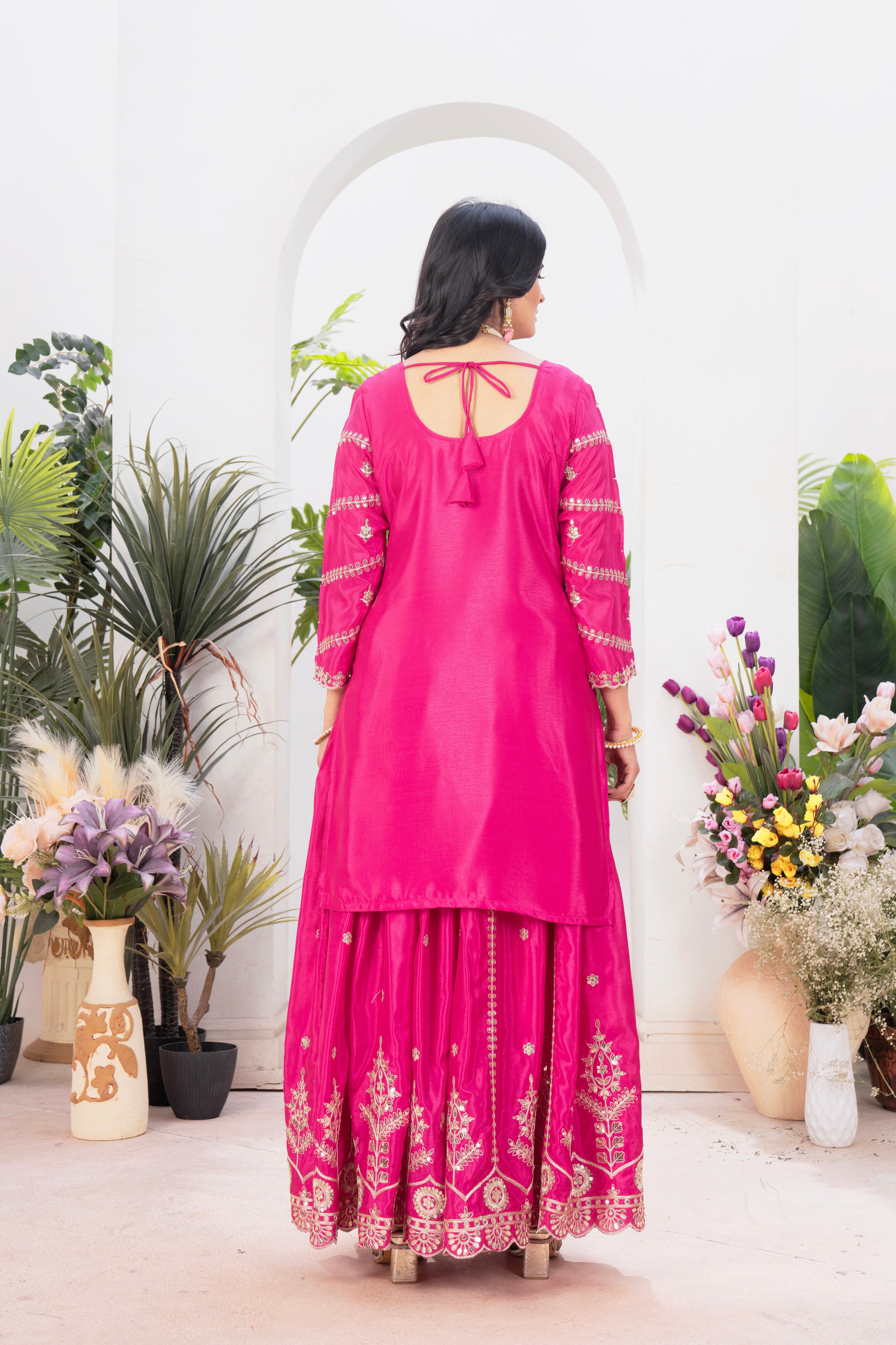 With this gorgeous pink lehenga sharara outfit, which combines tradition and modern flair, you may step into elegance.