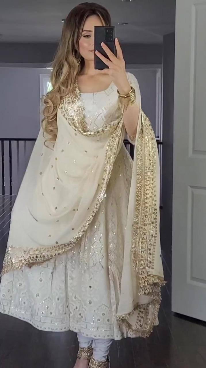 #ChicAnarkali #EthnicChic #TwirlWorthy #DesiFashion #WomenEthnicWear #PartyWearAnarkali #FashionistaStyle #GlamEthnicLook #BridalFashion 