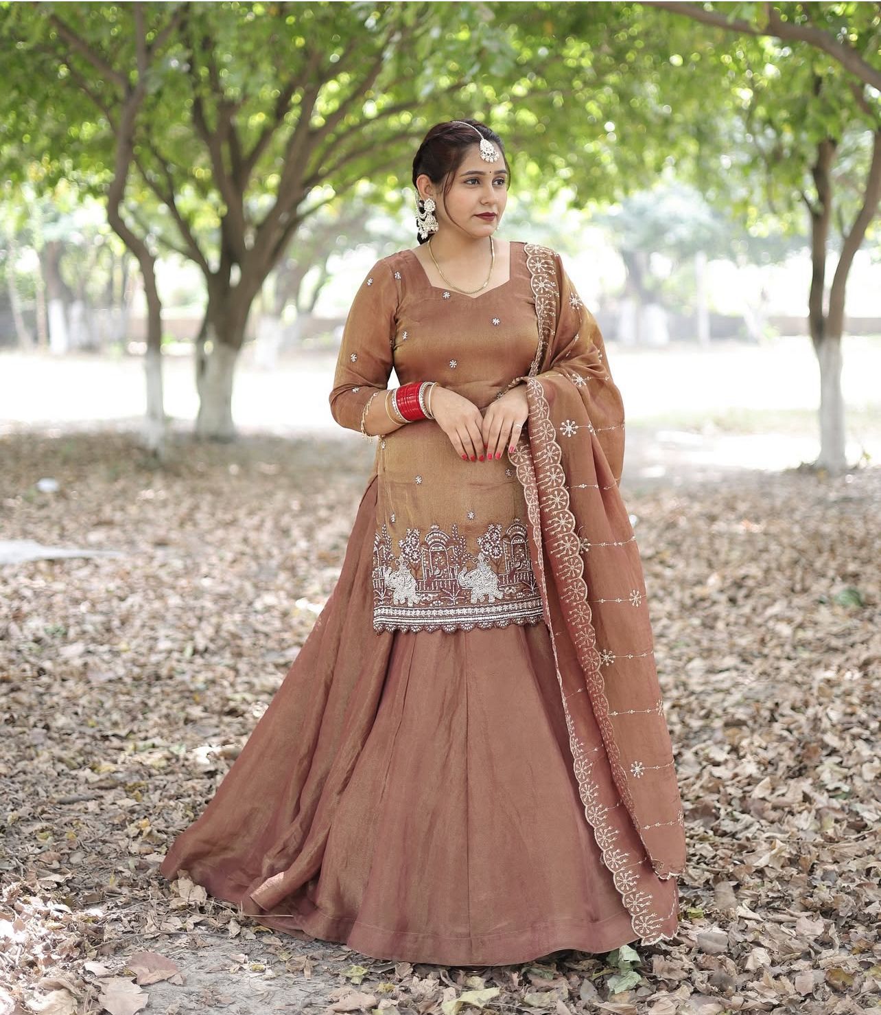 #ShimmerSilk

#DesignerLehenga

#PartyWearLehenga

#WeddingWear

#EthnicElegance

