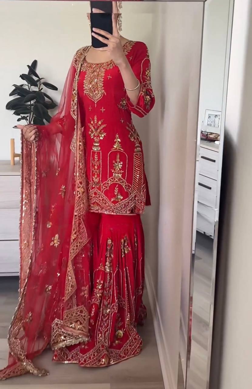 #StatementEthnic #IndianFashion #DesiDivas #PartyWearSuit #StyleDiaries #GlamorousLook #LuxuryEthnicWear #RedForTheWin #ShararaLove #DesignerEthnicWear #OOTDInRed

