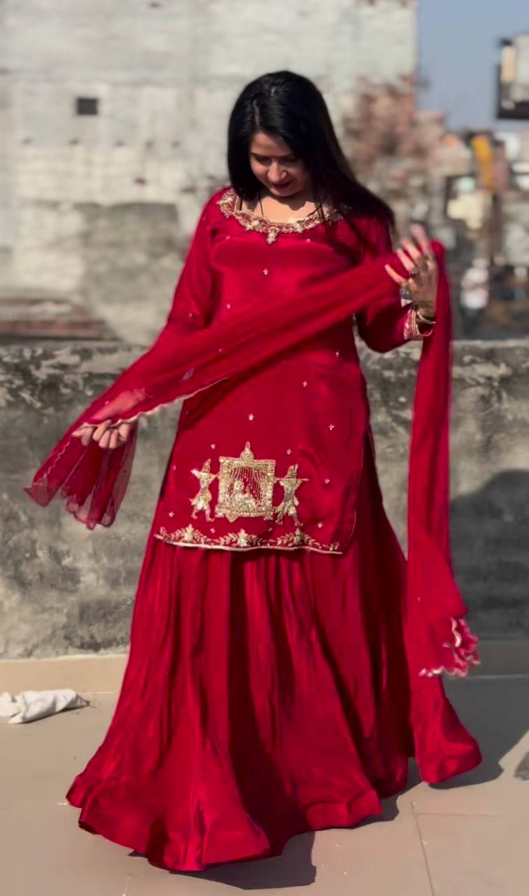 Work top, dupatta, and skirt in a red crepe silk lehenga set with beads for a wedding or party.