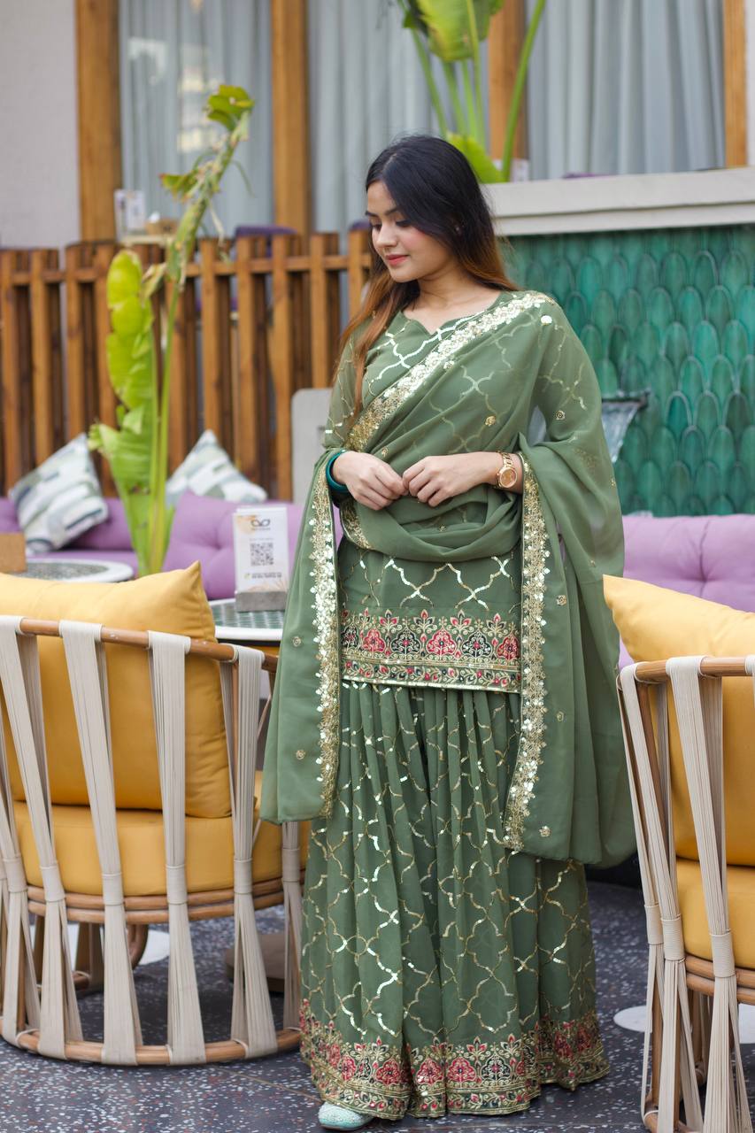 Green ethnic outfit
Embroidered traditional suit
Elegant sharara ensemble
Green bridal sharara
Designer sharara set
Festive sharara attire
Traditional green attire
Embellished sharara suit
Wedding sharara ensemble
Luxury green suit
Chic sharara dress