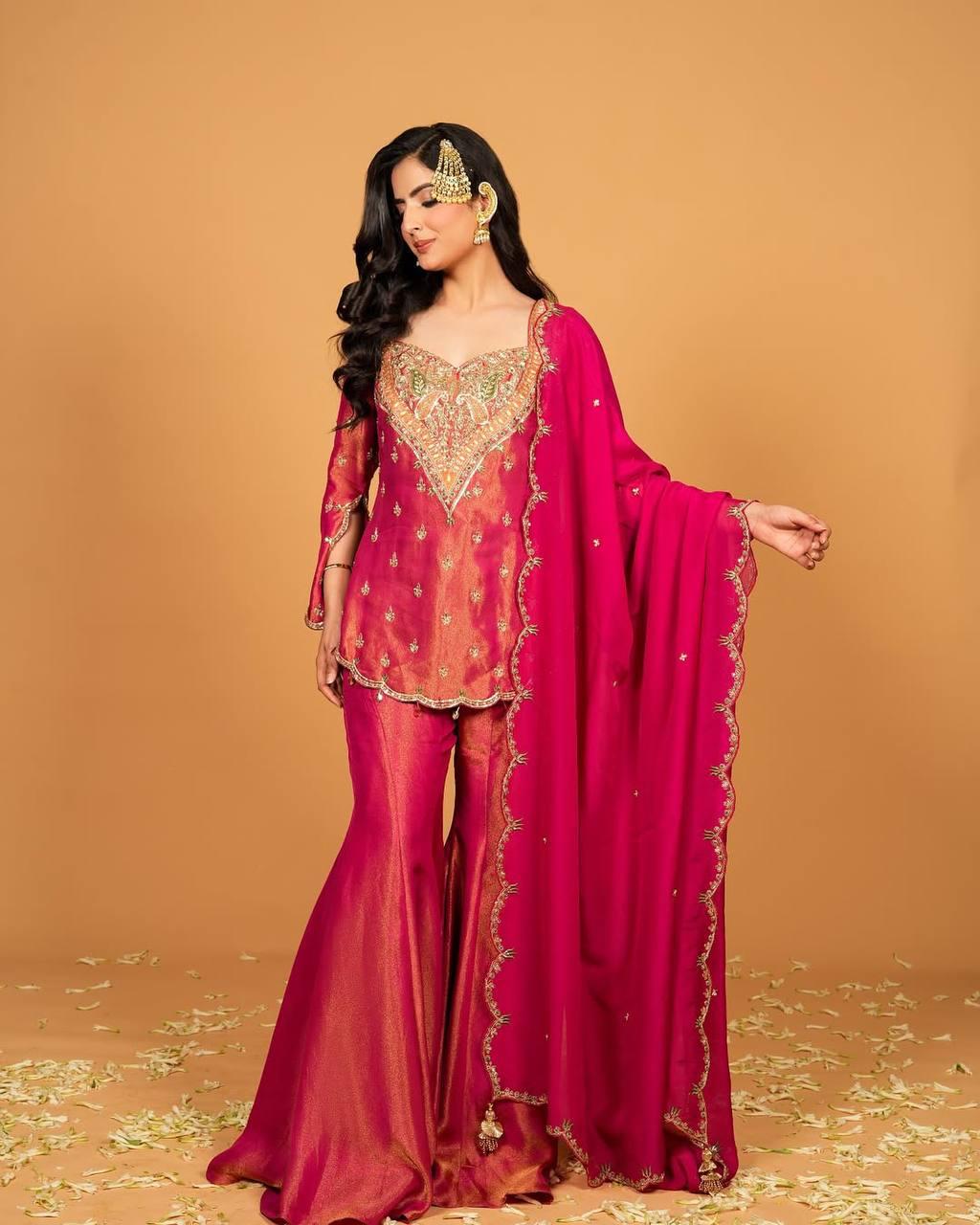 Embroidered Peach & Rani Pink Georgette Sharara Suit with Heavy Neckline Work