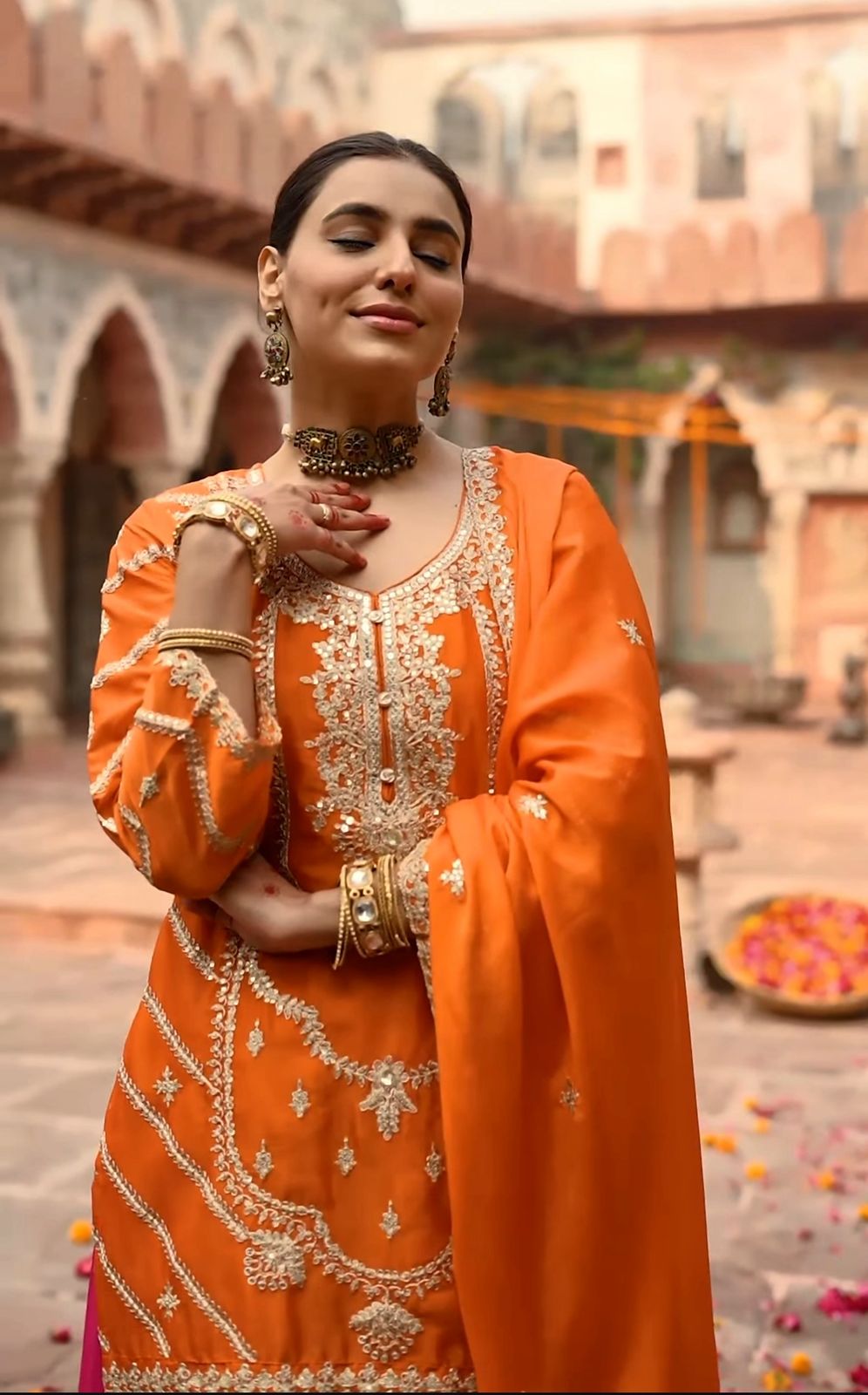 Beautiful Orange and Pink Sharara Suit Ideal for This Holiday Season