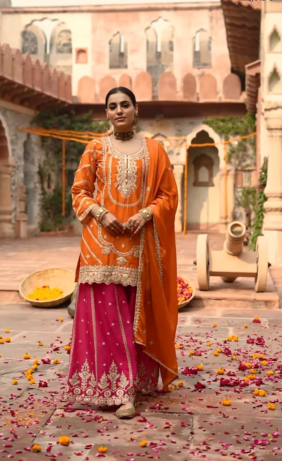 Beautiful Orange and Pink Sharara Suit Ideal for This Holiday Season