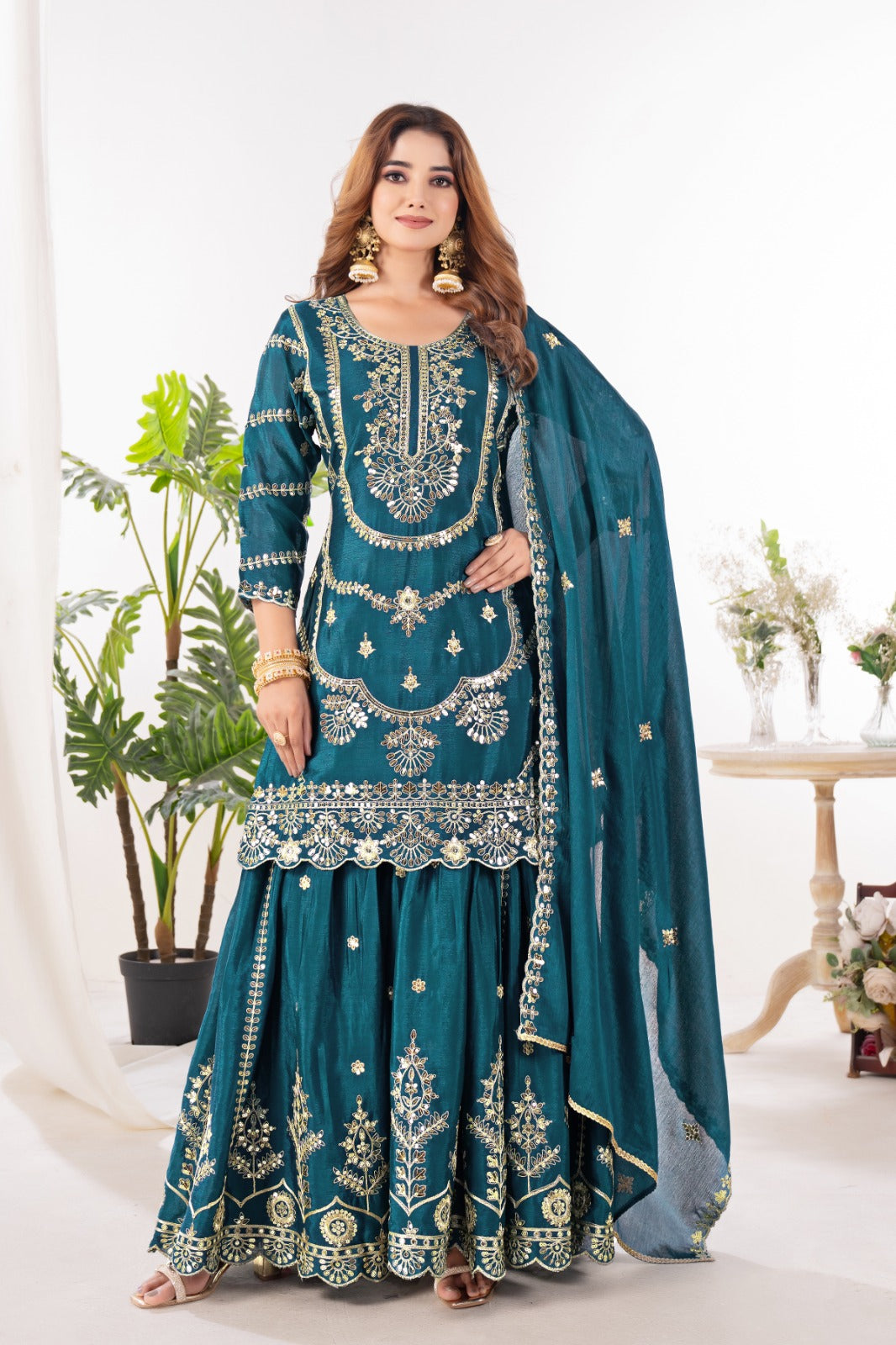 Embrace sophistication in this exquisite purple lehenga sharara suit, which combines classic design elements with modern flair.
