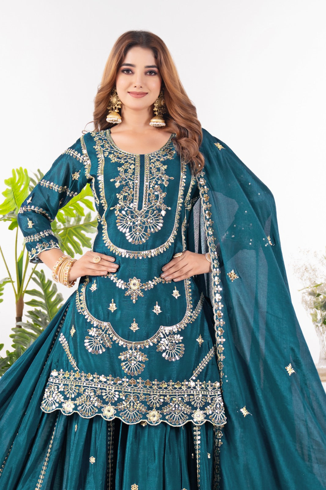 Embrace sophistication in this exquisite purple lehenga sharara suit, which combines classic design elements with modern flair.