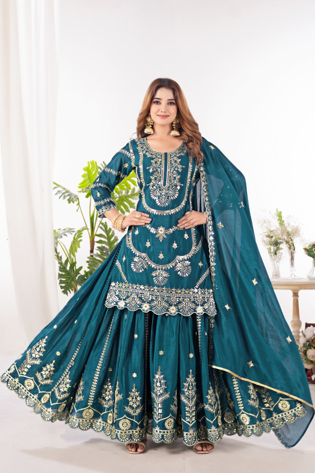 Embrace sophistication in this exquisite purple lehenga sharara suit, which combines classic design elements with modern flair.