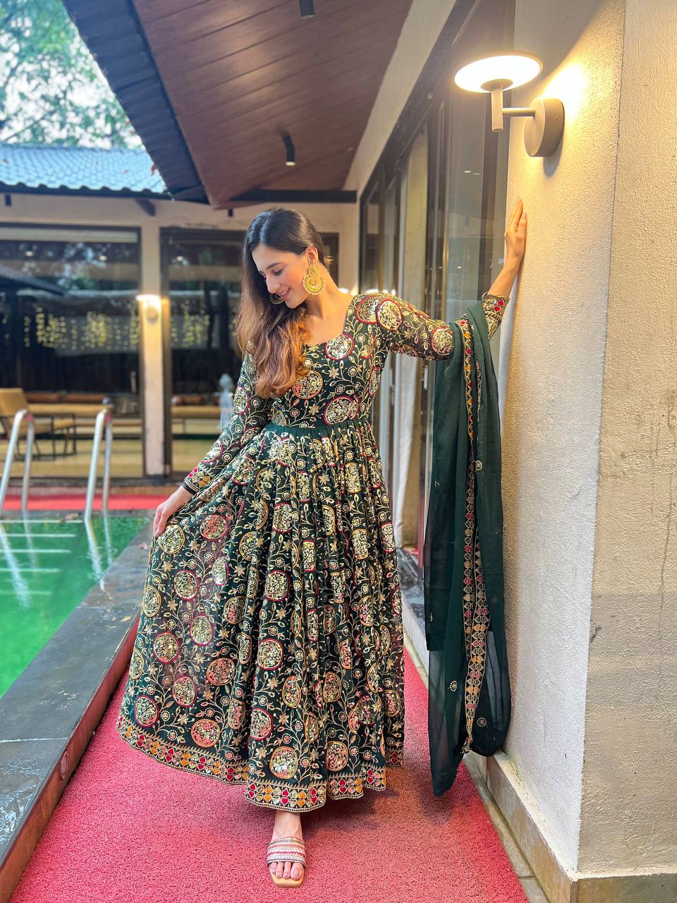 Stylish ethnic gown
Green gown for festivals
Handmade embroidery gown
Premium green gown
Green embroidered maxi dress
Boutique gown collection
Green gown with belt
