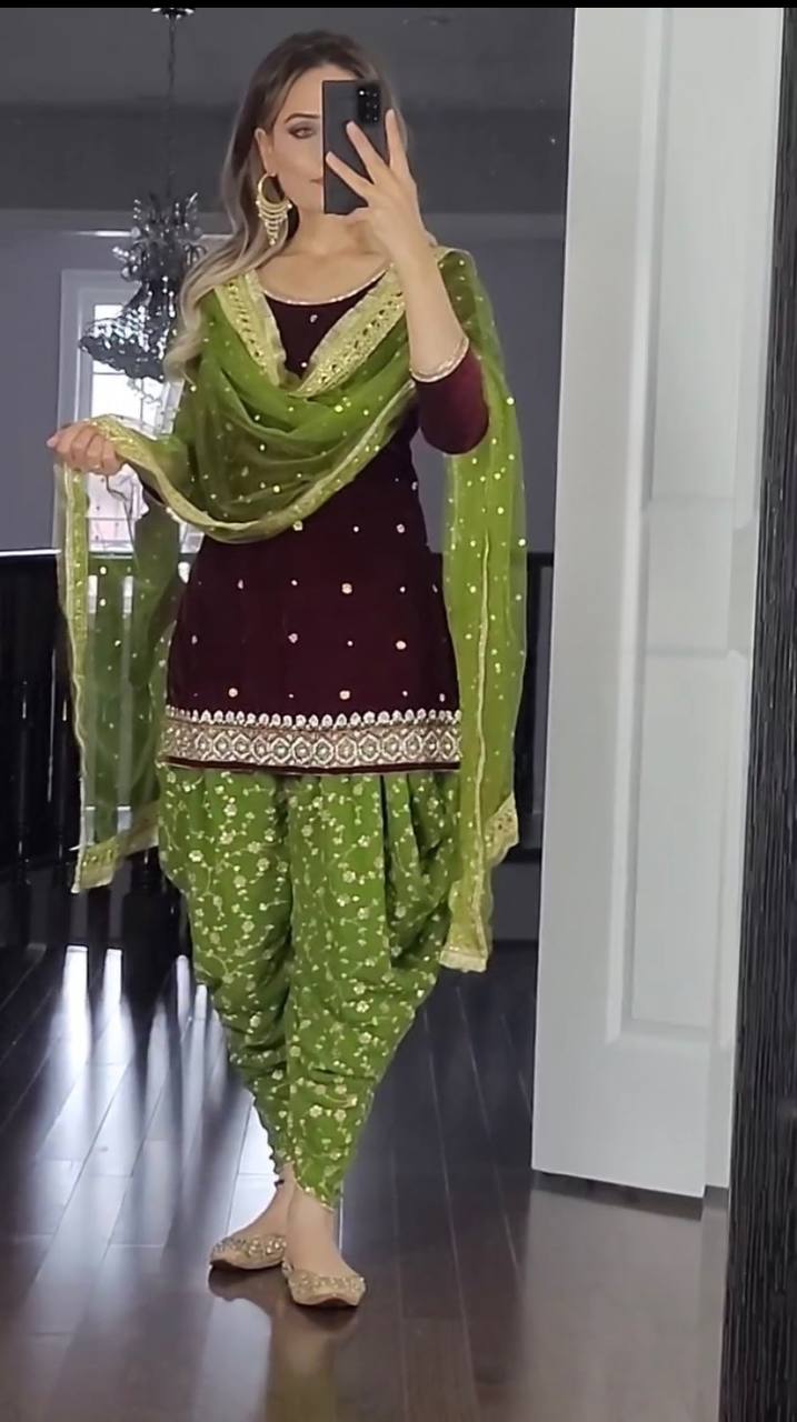 Our Marron Color embroidered Patliya suit is designed for your special occasions, so you can shine with elegance at every event.