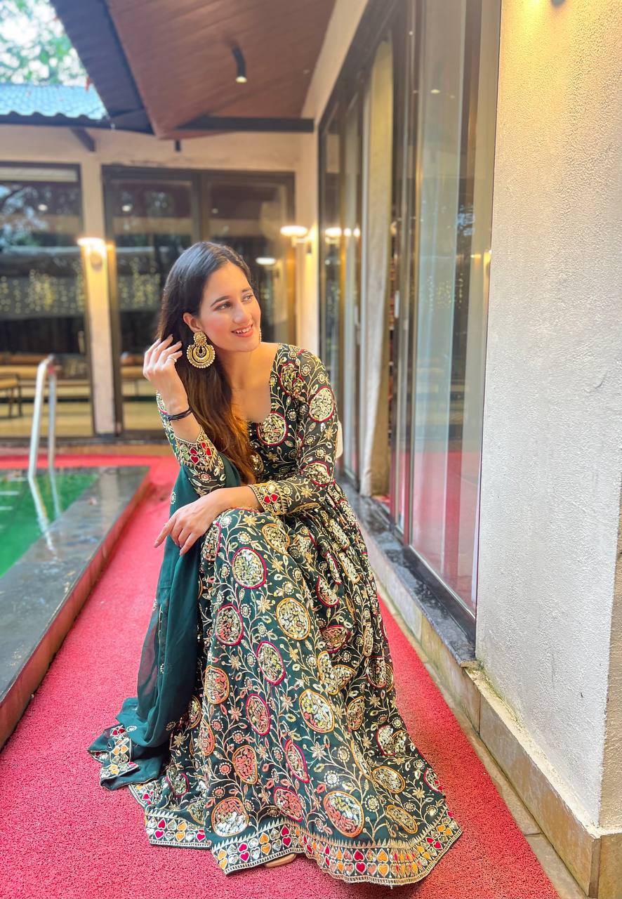 Designer party gown
Mirror work green gown
Embroidery work gown
Gown for festive wear
Green velvet gown
Latest gown collection
Elegant embroidered gown
Indian ethnic gown
Gown with zari work
Embroidered gown dress
Couture green gown
Indo western green gown

