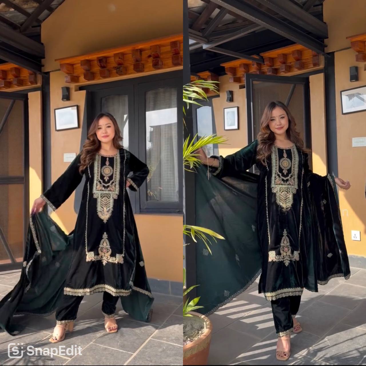 Woman in a green traditional outfit with gold embroidery standing in front of a building.